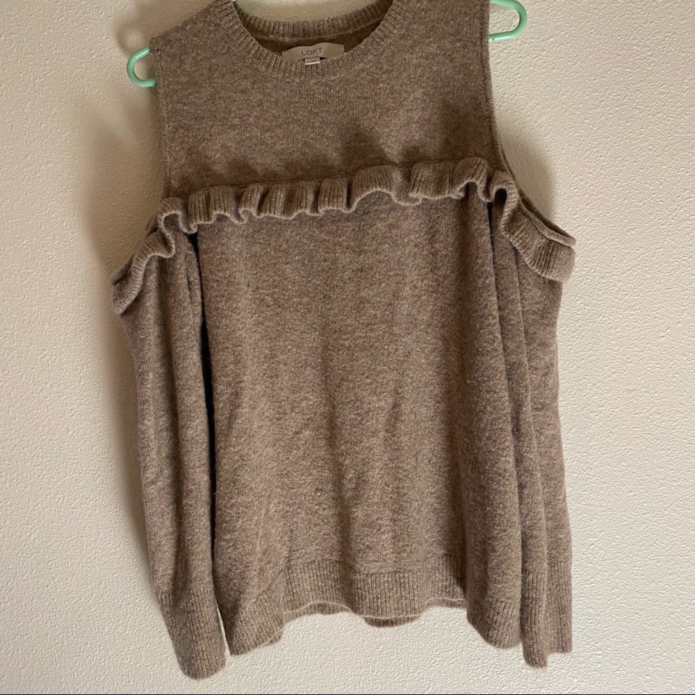 Used off shoulder sweater.